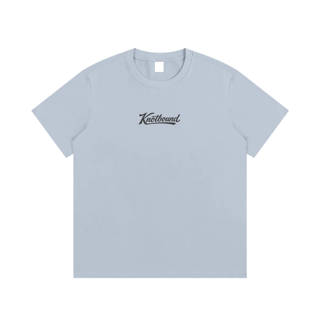 A light blue crewneck t-shirt with a black cursive 'Knockbound' logo printed on the chest, displayed flat against a solid white background.