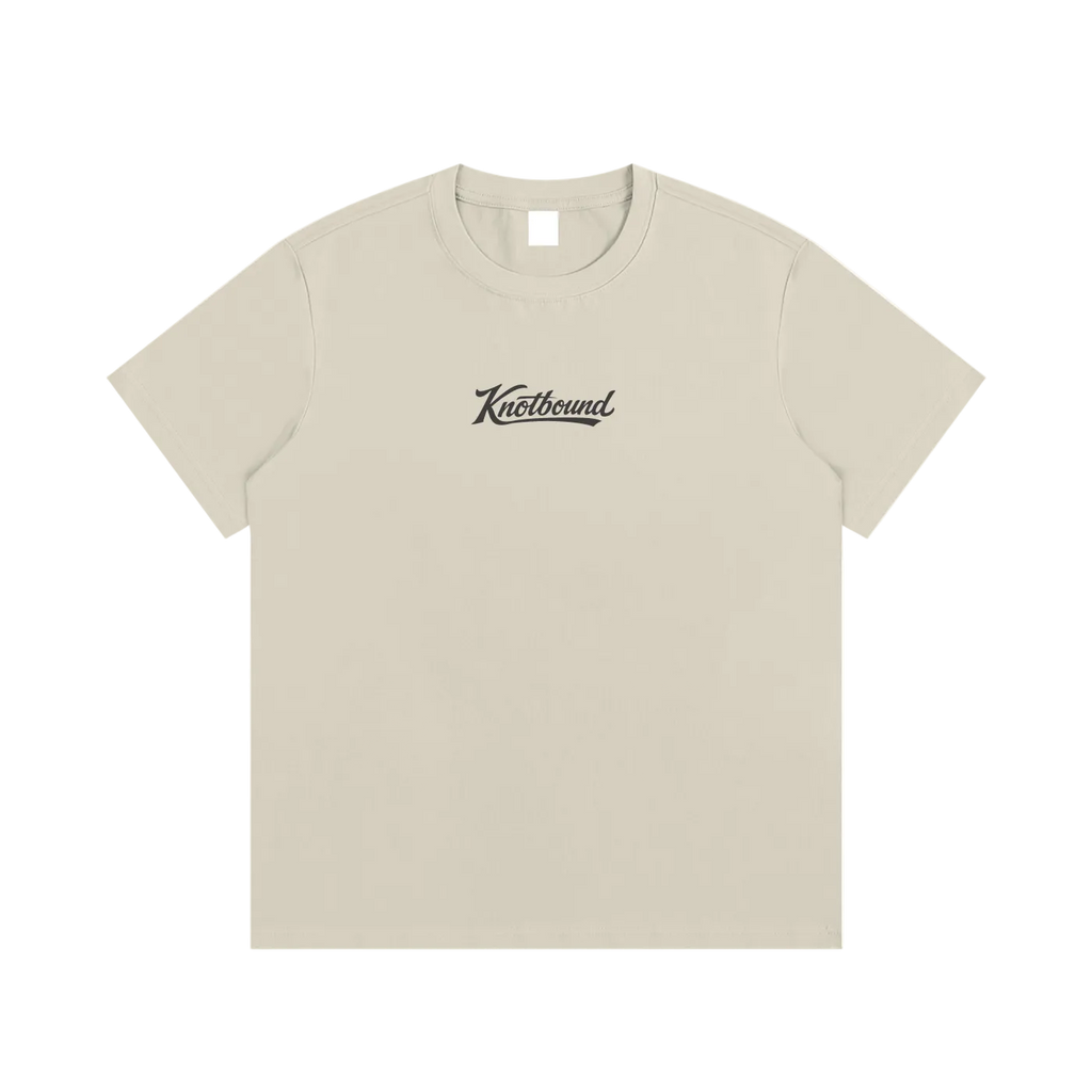 Front view of the LBI Locals x Knotbound tee in beige, with the Knotbound script logo printed on the chest.