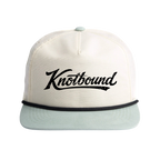 Front view of the Knotbound Surf Cap in sea foam, an unstructured low profile nylon cap.
