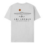 A light gray short-sleeve t-shirt shown from the back, featuring a black line art graphic of a bridge, a sign, and a brown sun, with the text 'LBI LOCALS' and 'LONG BEACH ISLAND, NJ' printed below.