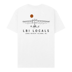 A white short-sleeve crewneck t-shirt with a black line art graphic of a bridge, a sign reading 'LONG BEACH ISLAND', and a brown sun on the back. Below the graphic, the text 'LBI LOCALS' and 'LONG BEACH ISLAND, NJ' is printed in black.