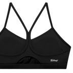 A black sports bra with a crossover criss-cross back strap design and a small white script logo on the lower right side, displayed against a solid white background.