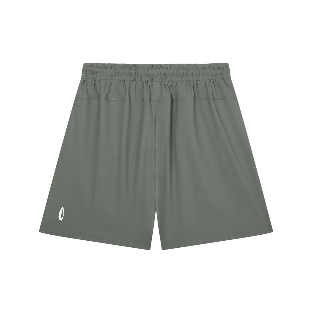 A pair of athletic shorts in a muted gray-green color, featuring an elastic waistband and a small white logo on the lower left leg, displayed against a plain white background.