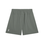 A pair of athletic shorts in a muted gray-green color, featuring an elastic waistband and a small white logo on the lower left leg, displayed against a plain white background.